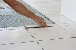 Fixing detached tiles on a surface of 12m2 